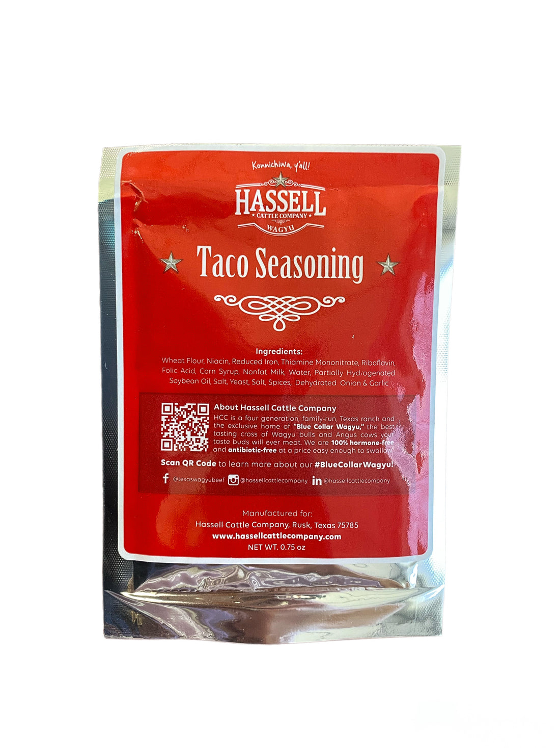 A pack of Hassell Cattle Company Taco Seasoning, featuring a sleek label with bold branding, filled with a rich, earthy-colored spice blend, set against a clean, neutral background