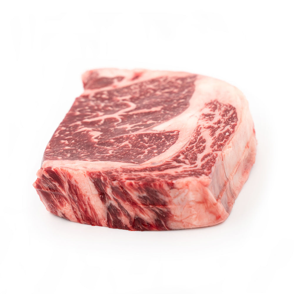 Juicy, tender Ribeye steak, showcasing rich marbling and full flavor, perfect for grilling or pan-searing for a delicious meal.