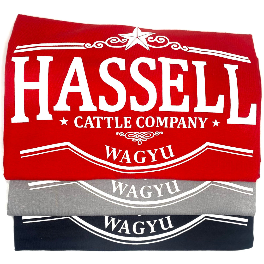 Hassell Cattle Company Logo T-Shirt in a comfortable fit, featuring the iconic Hassell logo, available in red, gray, and black.
