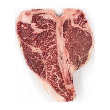 Porterhouse steak from Hassell Cattle Company, a perfectly marbled cut offering both tenderloin and strip steak in one, ideal for grilling or pan-searing.