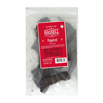 Premium beef jerky from Hassell Cattle Company, available in various flavors including peppered, pepper garlic, and steakhouse, offering a tender, flavorful snack perfect for on-the-go.