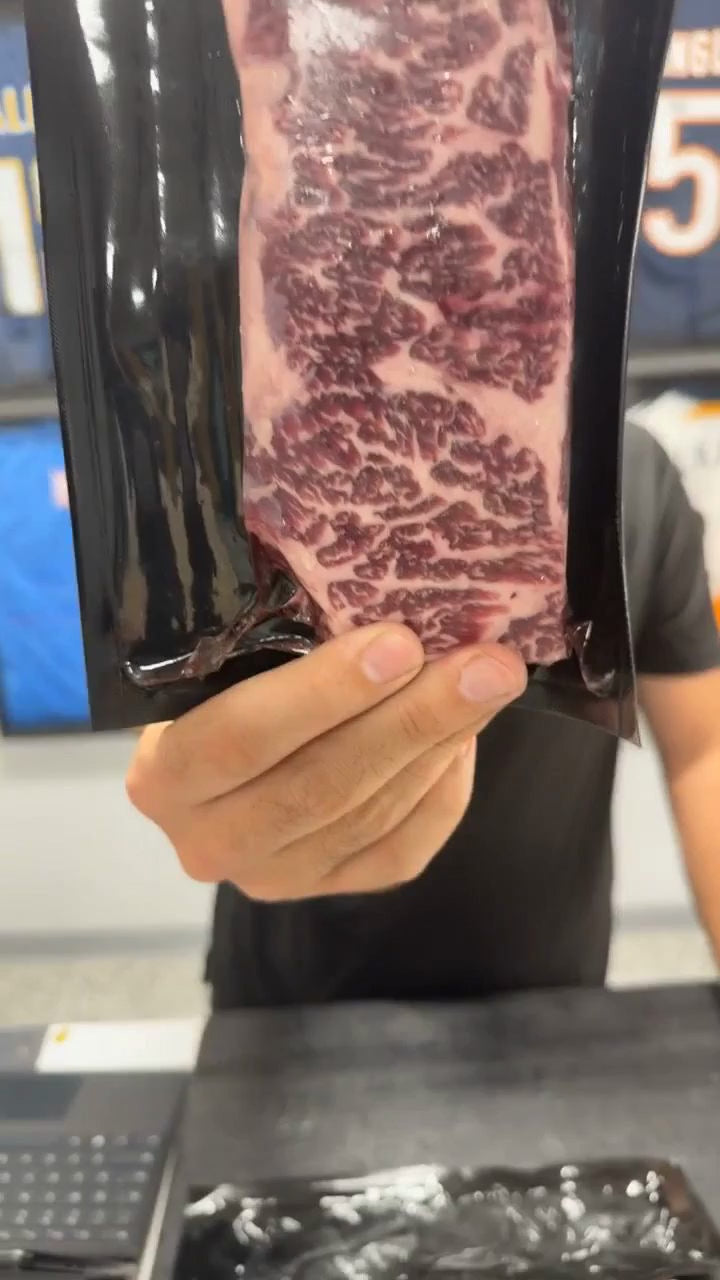 Denver steak marbling shown on a Hassell live show