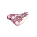 A thick, Hassell Cattle Company T-bone steak, showcasing its rich marbling and vibrant red color, placed on a clean, crisp white background.