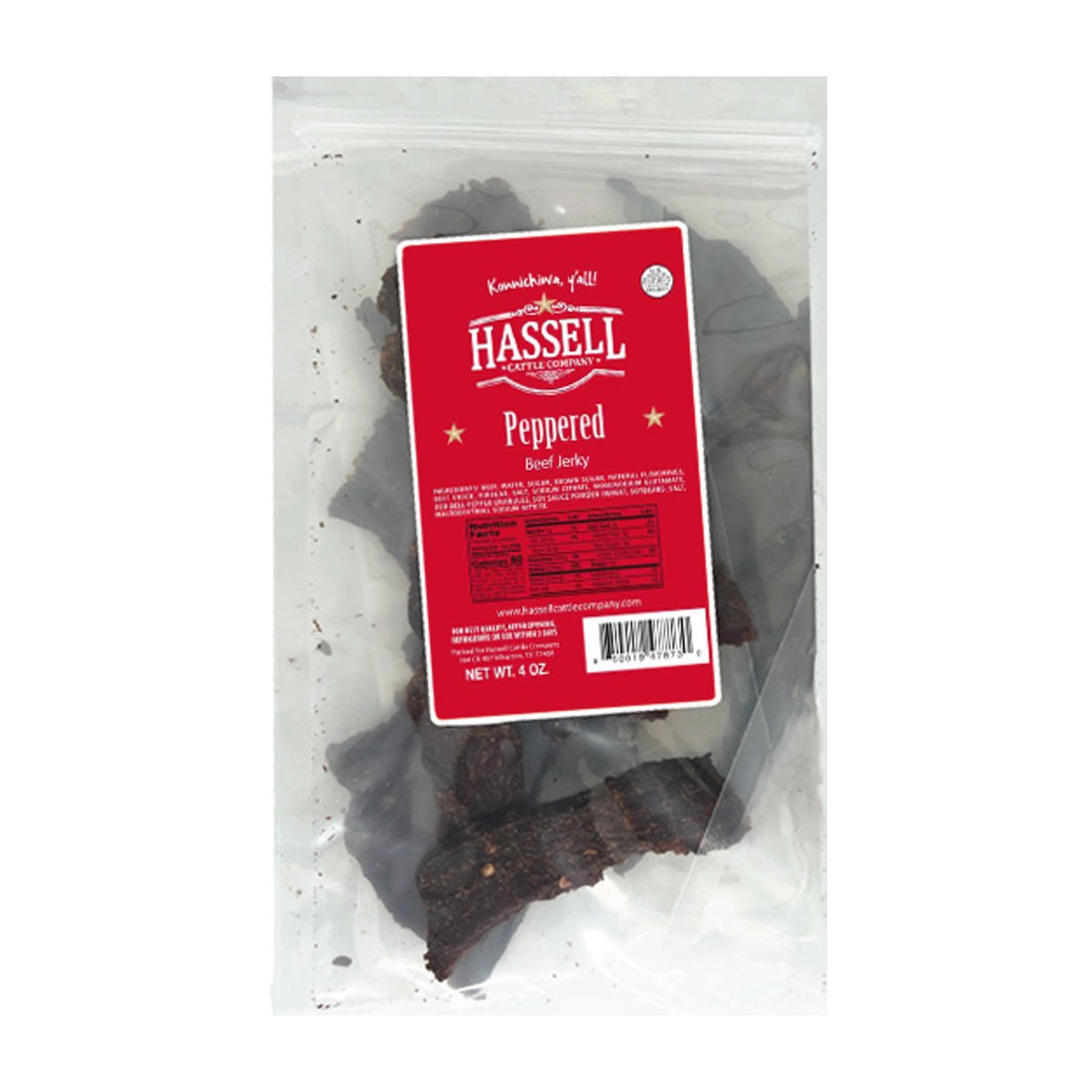 Pile of peppered Hassell Wagyu jerky with clear 4 oz bags on a ranch table