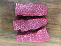 Wagyu Denver steaks on the butcher block