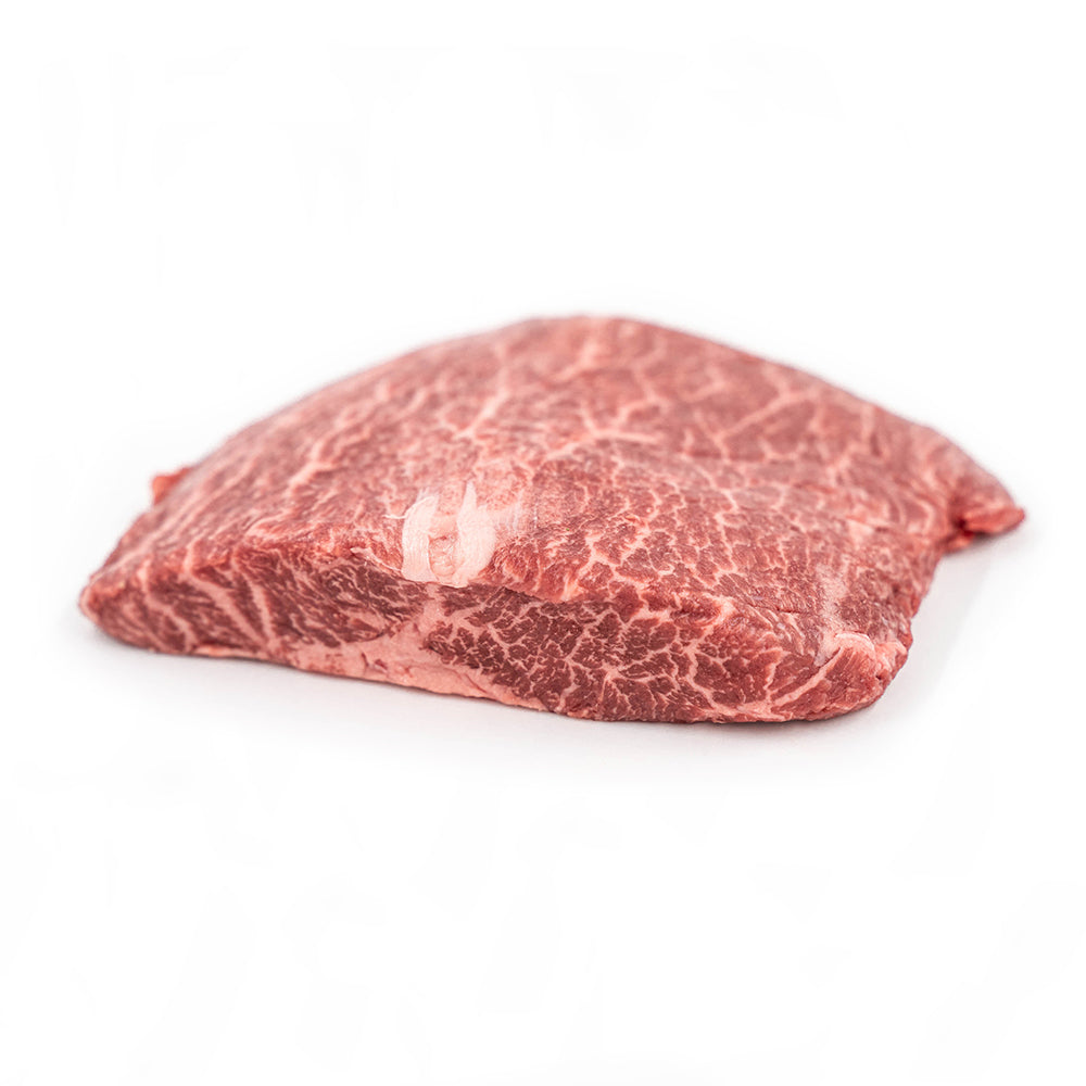 Tender and juicy flat iron steak, known for its rich marbling and perfect for grilling or pan-searing.