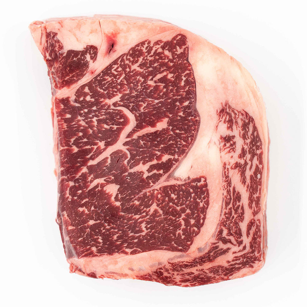 Juicy, tender Ribeye steak, showcasing rich marbling and full flavor, perfect for grilling or pan-searing for a delicious meal.